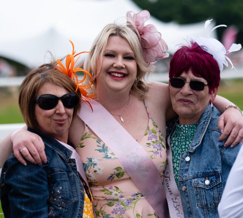 A bride to be poses with other members of her hen do at Worcester Races